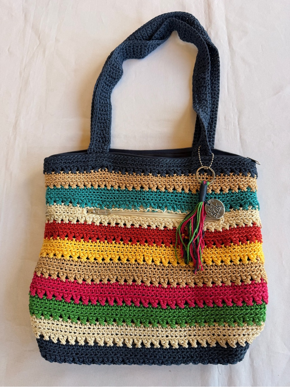 The Sak Multicolor Crochet Woven Stripe Shoulder Bag with Charm
